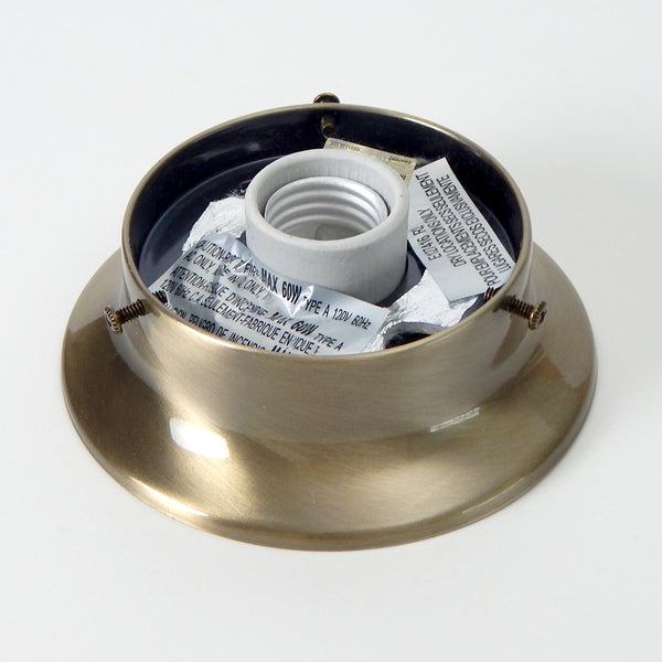 3 1/4 inch flush mount light fixture fitter/shade holder with your choice of polished chrome, satin nickel, or antique brass finishes. Its simple low profile design is a solid choice for Mid-Century era glass shades whether it's a wall-mounted sconce or a ceiling-mounted light. Available at www.vintporium.com