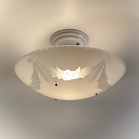 1950s semi-flush ceiling light with enameled floral glass bowl installed on ceiling