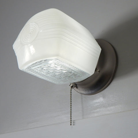 Vintage Art Deco wall light with enameled milk glass shade and satin nickel pull-chain base — available at Vintporium.