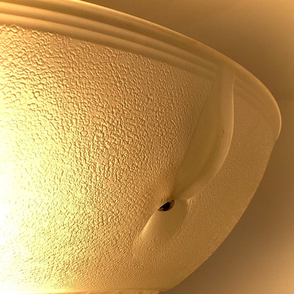 Detailed view of the frosted textured glass and mounting point on a 1930s powder-coated Art Deco ceiling light by Vintporium.