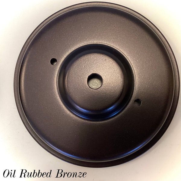 Oil-rubbed bronze round ceiling canopy with center wire hole and mounting screw holes, used for vintage and modern light fixture restoration at Vintporium.