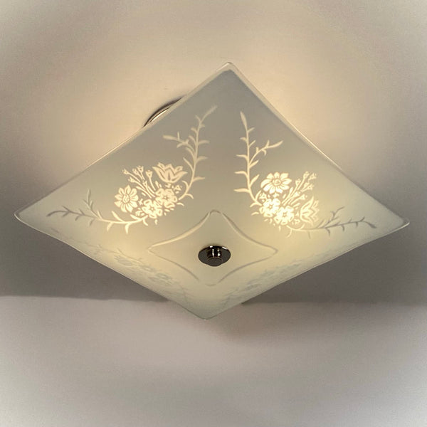 Vintage square flush mount ceiling light viewed from below, frosted glass with etched flowers