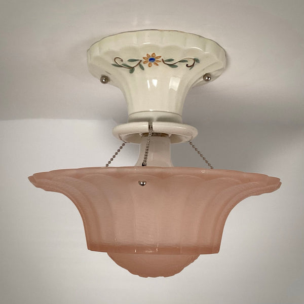 Vintage 1930s semi-flush light showing peach glass shade and porcelain fitter