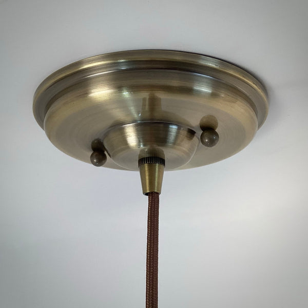 Brass canopy ceiling mount detail of rewired Art Deco pendant light