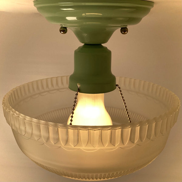 Interior view of vintage semi-flush ceiling light showing socket assembly