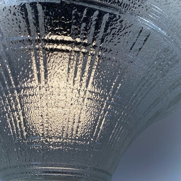 detailed rim view of vintage pressed glass ceiling light shade with minor age-appropriate wear