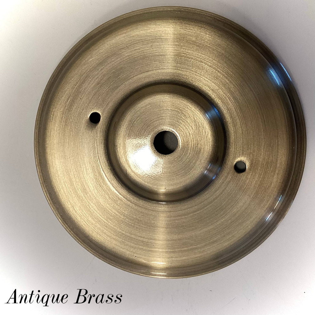 Antique Brass round ceiling canopy with center wire hole and mounting screw holes, used for vintage and modern light fixture restoration at Vintporium.