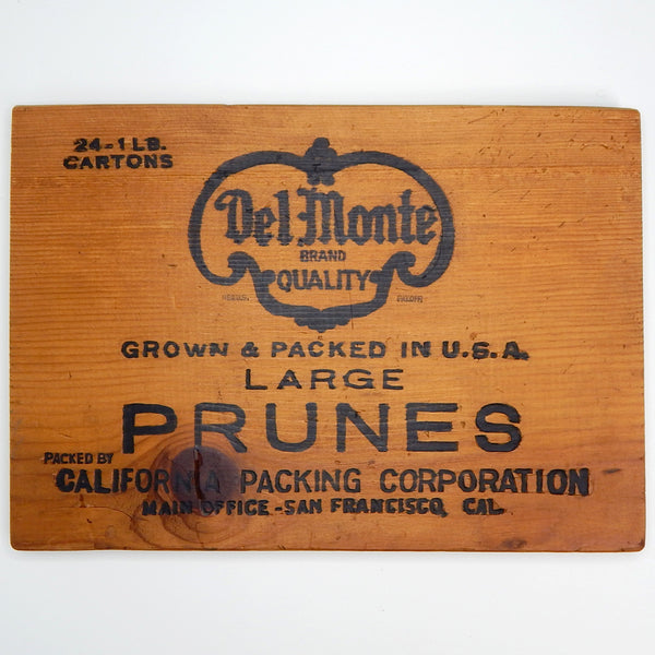 Antique Del Monte crate end,  one side labeled  Blenheim Apricots and the other side prunes. Available at www.vintporium.com