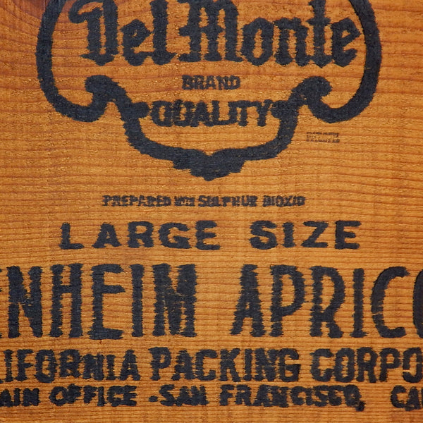 Antique Del Monte crate end,  one side labeled  Blenheim Apricots and the other side prunes. Available at www.vintporium.com