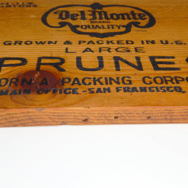 Antique Del Monte crate end,  one side labeled  Blenheim Apricots and the other side prunes. Available at www.vintporium.com