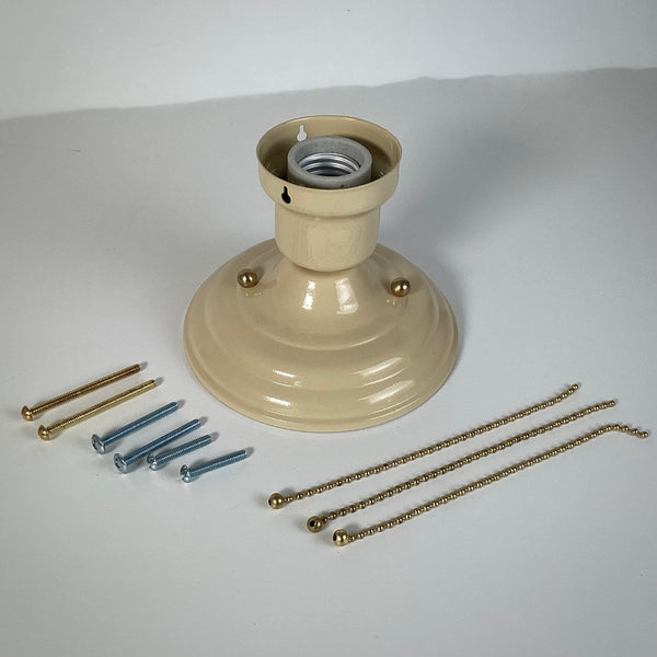 The custom-made triple-beaded chain fixture kit is powder-coated and comes in your choice of white with nickel hardware, pistachio with nickel hardware, creme with brass hardware, or light khaki with brass hardware. Available at www.vintporium.com