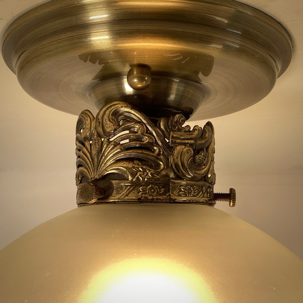 Vintage 1960s Art Nouveau Revival Semi-Flush Ceiling Light Fixture. The restored ceiling light features a new aged brass ceiling canopy with new wiring, a new socket, etc., while preserving its authentic 196s0s appeal. The fixture has been cleaned and detailed, and the hardware is included for a convenient installation. Available at www.vintporium.com