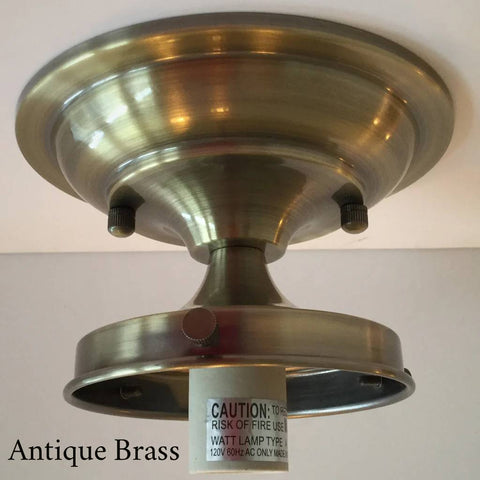 Antique brass semi-flush mount light fixture canopy with 4-inch fitter and socket base, featuring a warm brushed brass finish and classic vintage styling — Vintporium