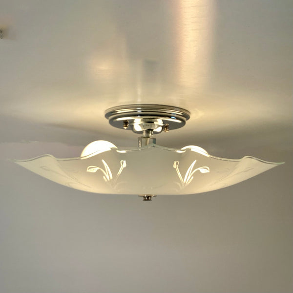 Post-War Era Ceiling Light. Vintage Shade. Custom Fixture. The fixture features a custom-built assembly in a nickel finish. The light has been cleaned and detailed, and the installation includes hardware for convenience. Available at www.vintporium.com