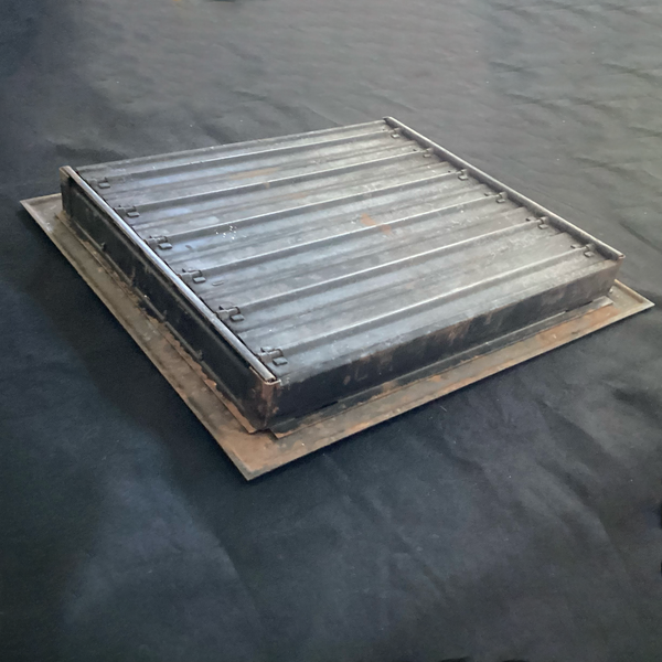 Antique Steel Hear Floor Register. Add a touch of industrial charm and historic character to your space with this antique 1910s heat register, featuring a classic square grid design and working damper lever. Available at www.vintporium.com