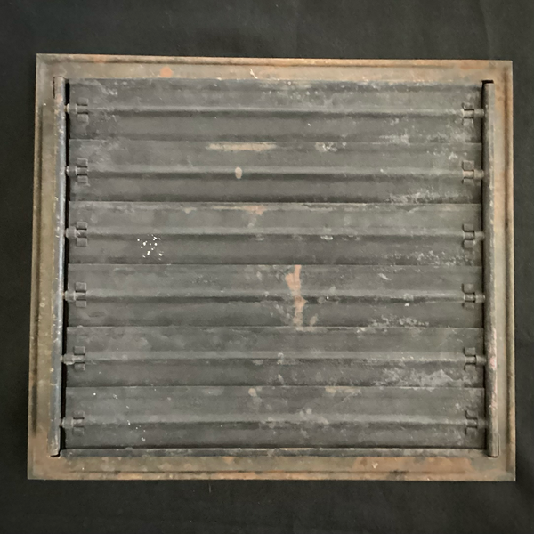 Antique Steel Hear Floor Register. Add a touch of industrial charm and historic character to your space with this antique 1910s heat register, featuring a classic square grid design and working damper lever. Available at www.vintporium.com