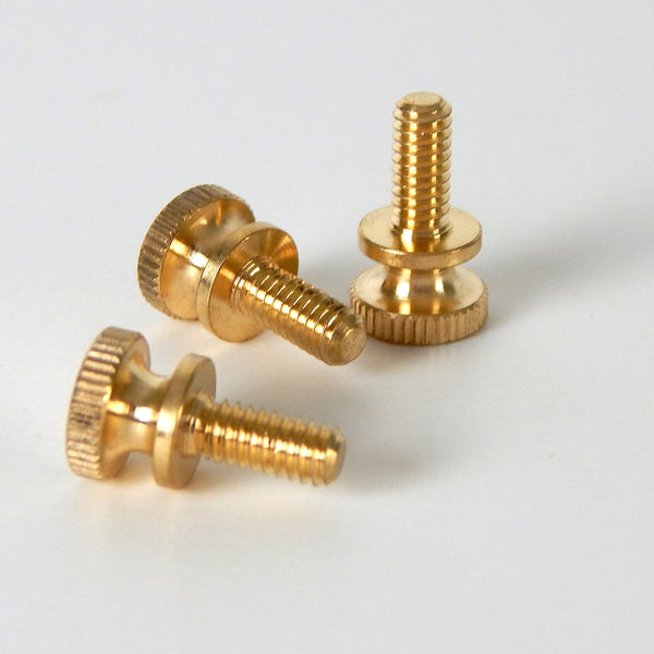 This lot of 3 handsome little thumbscrews are ideal for securing shades to the fixture as well as securing the fixture to its mounting brackets. Available in unfinished brass. Available at www.vintporium.com